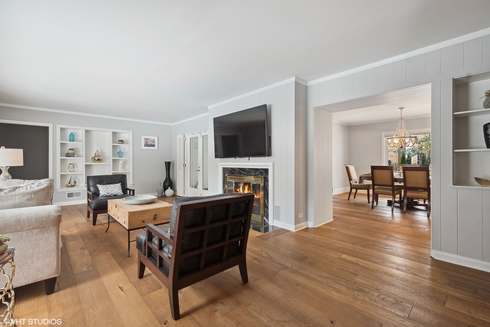 526 Coronet Road Glenview, IL 60025 - Photo 5 of 23 a living room with fireplace furniture and a flat screen tv