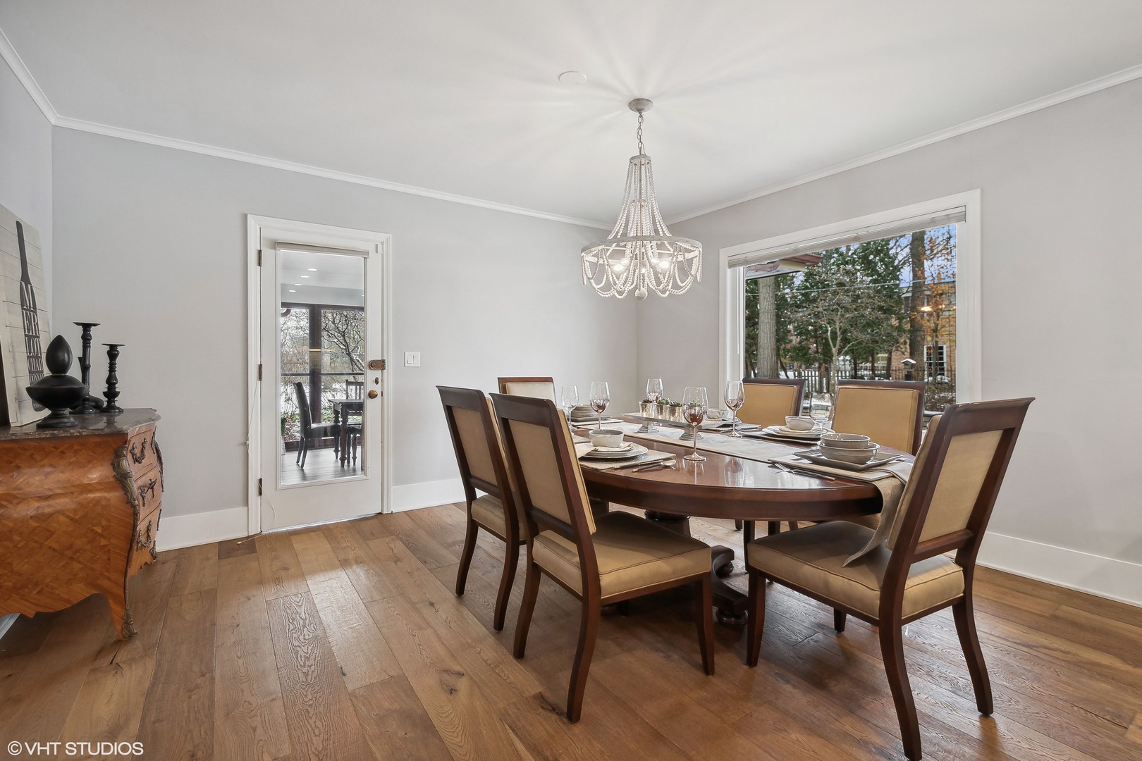 526 Coronet Road Glenview, IL 60025 - Photo 6 of 23 a view of a dining room with furniture window and wooden floor