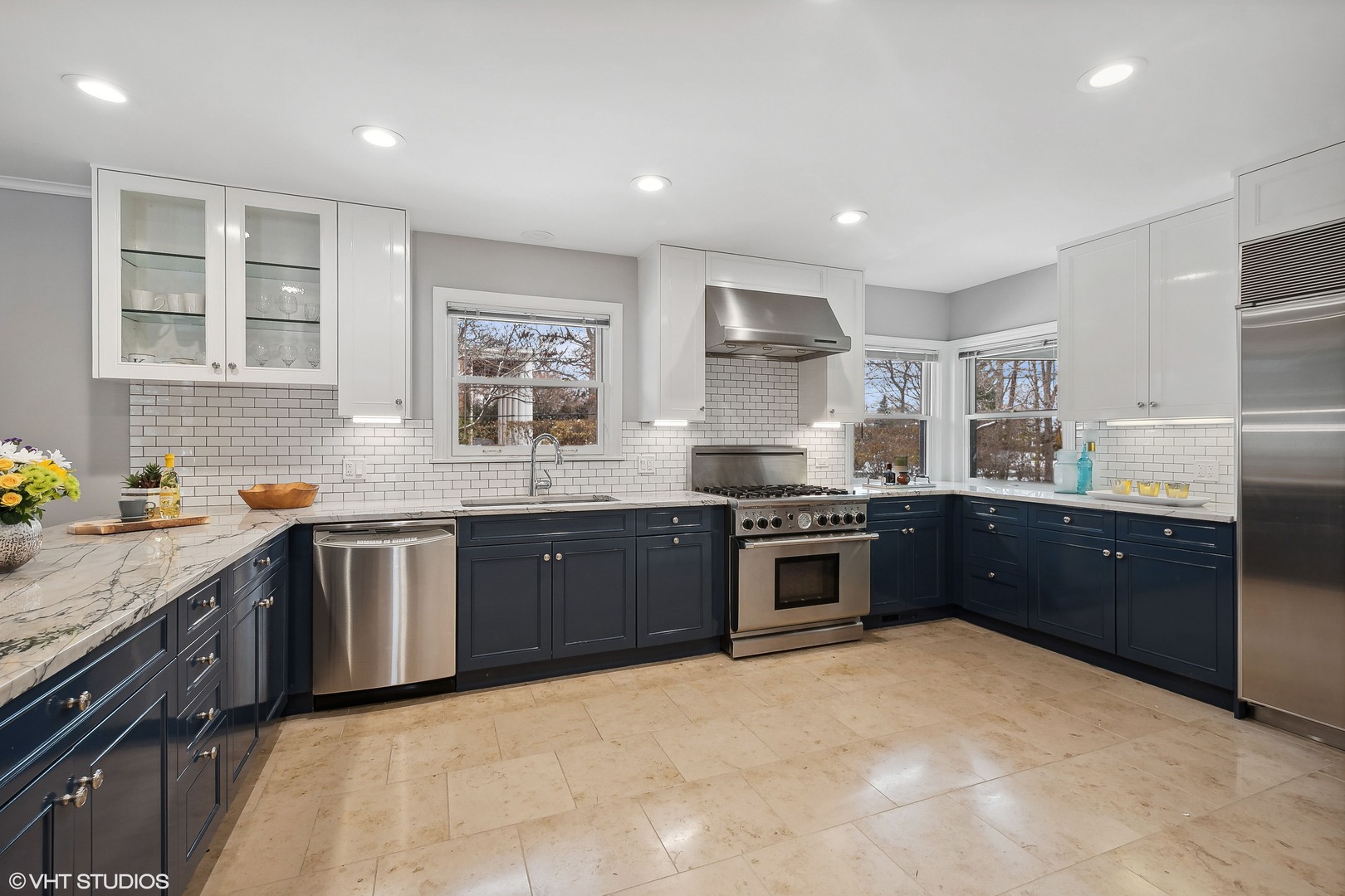 526 Coronet Road Glenview, IL 60025 - Photo 9 of 23 a large kitchen with stainless steel appliances granite countertop a stove sink and cabinets