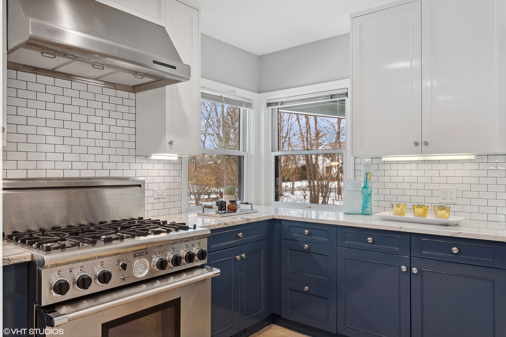 526 Coronet Road Glenview, IL 60025 - Photo 10 of 23 a kitchen with a stove a sink and a window