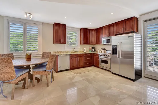 a workspace with furniture and a window