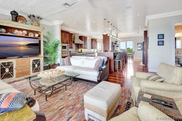 a kitchen with stainless steel appliances granite countertop a stove and a microwave