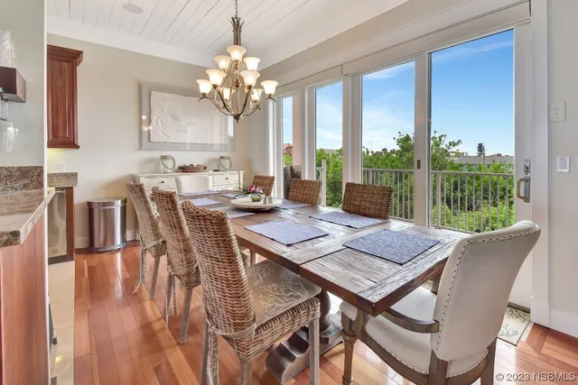 a living room with a bed furniture and a window