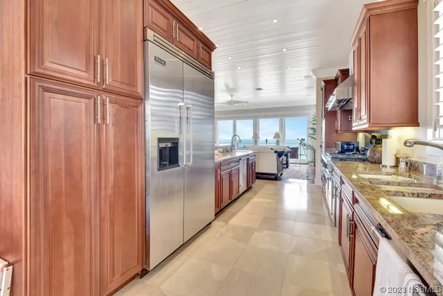 a bed room with a bed and a television