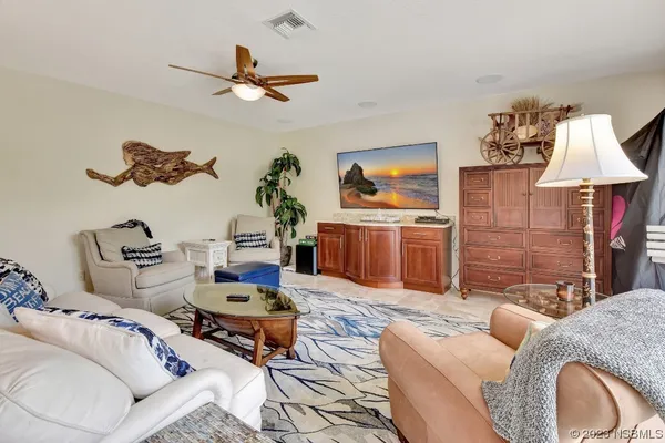 a living room with furniture or outdoor view and a large window