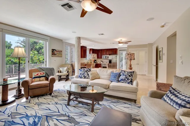 a bedroom with a bed and a view of bedroom