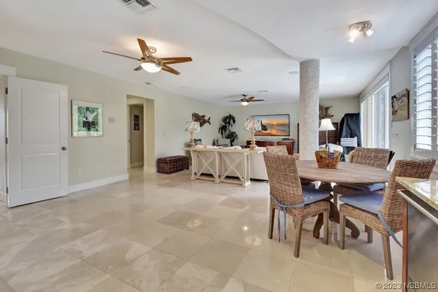 a bathroom with a granite countertop sink a mirror a shower and a bathtub