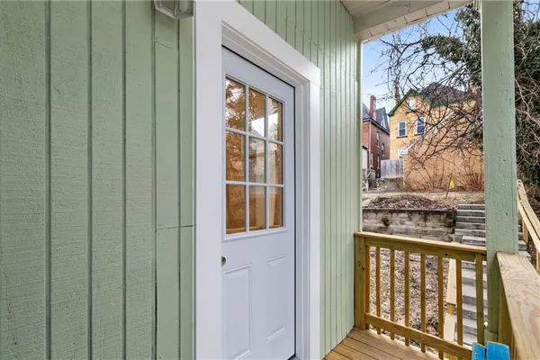 a view of a balcony and next to a window