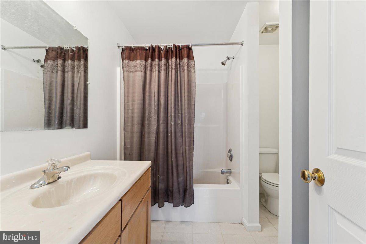 381 Baltimore Avenue Odenton, MD 21113 - Photo 31 of 42 Hall Bath with Stack Washer/Dryer