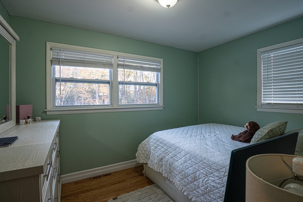 5 Bailey Road Dracut, MA 01826 - Photo 11 of 26 a bedroom with a bed and a window