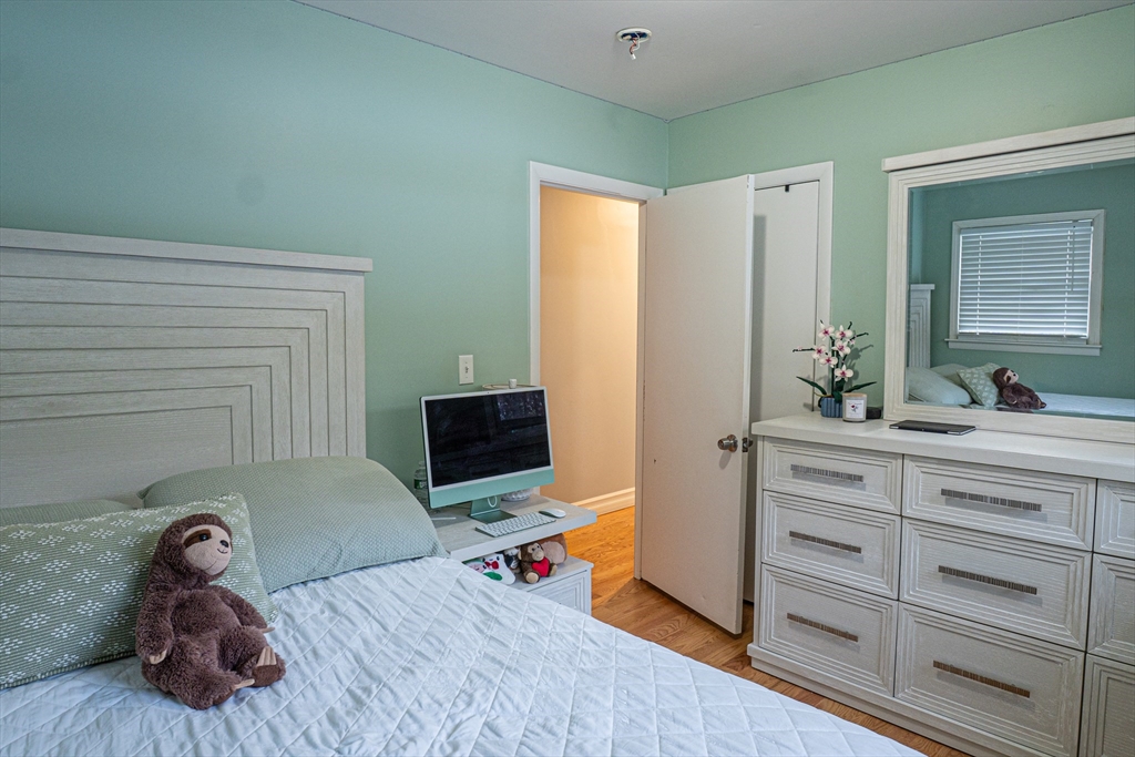 5 Bailey Road Dracut, MA 01826 - Photo 12 of 26 a living room with furniture and a flat screen tv