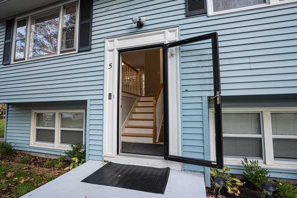 5 Bailey Road Dracut, MA 01826 - Photo 3 of 26 a view of a house with a door and a window