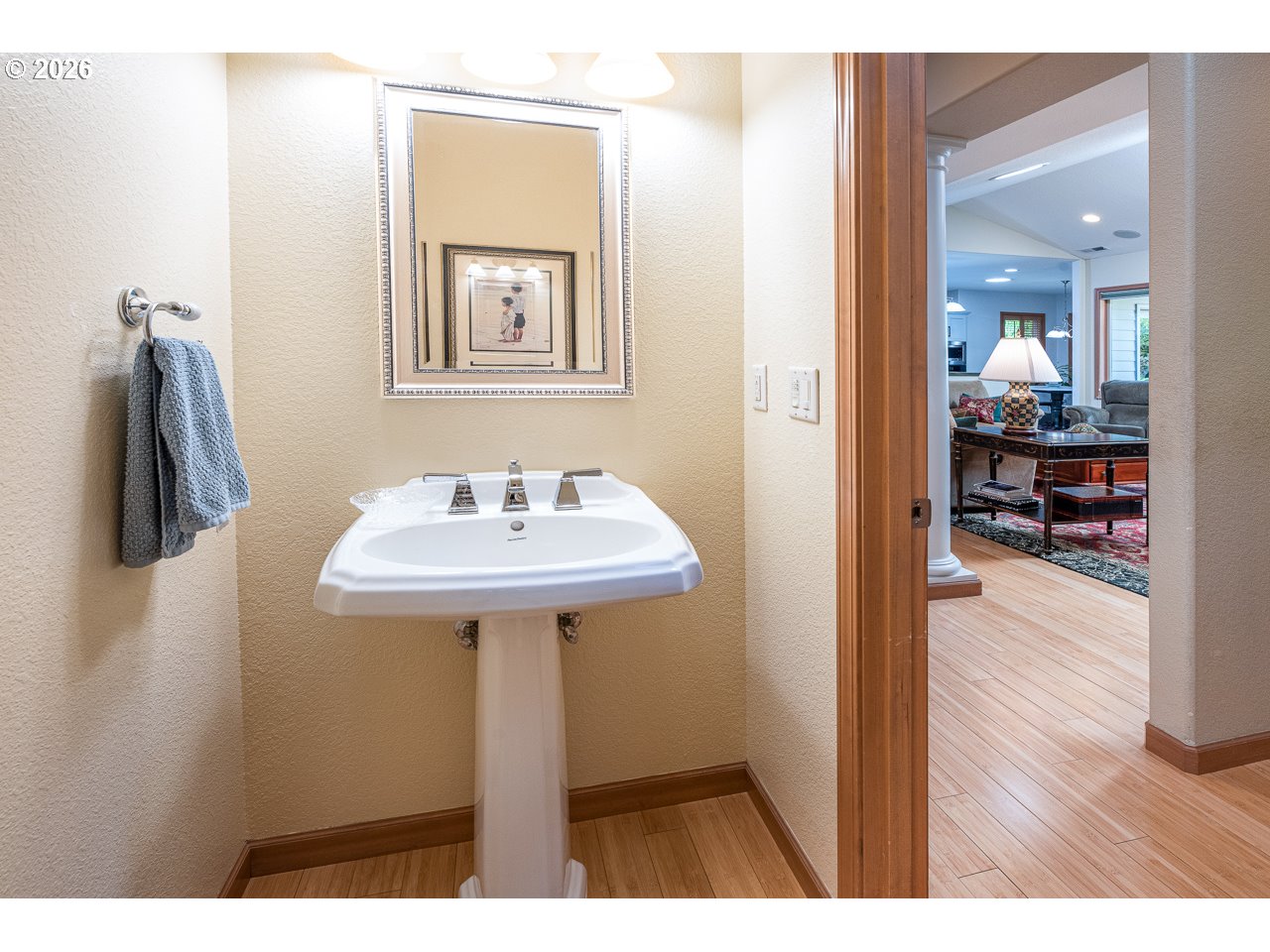 3381 Rosemont Way Eugene, OR 97401 - Photo 22 of 45 a bathroom with a sink a mirror and wooden floor