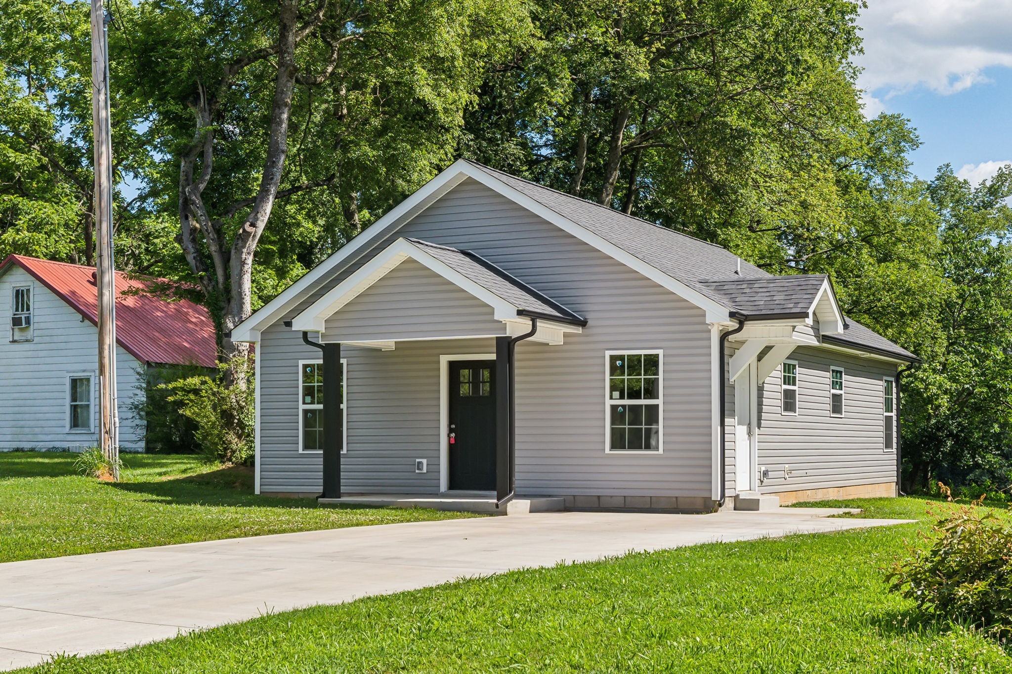 1816 Cunningham Ridge Clarksville, TN 37040 - Photo 1 of 32 a view of a house with a yard and large tree