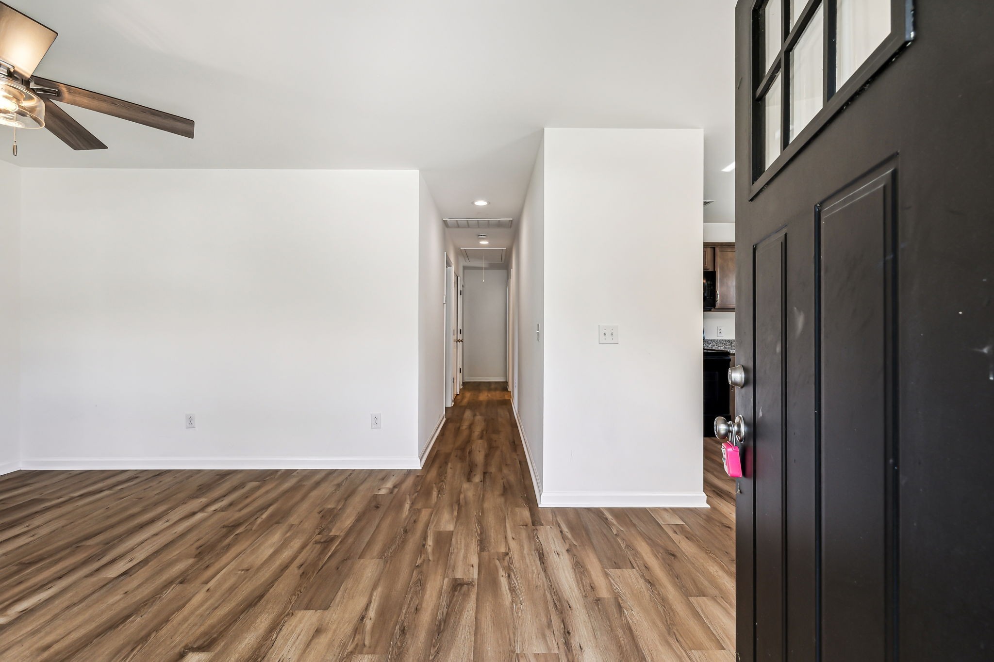 1816 Cunningham Ridge Clarksville, TN 37040 - Photo 5 of 32 a view of a room with wooden floor and stairs
