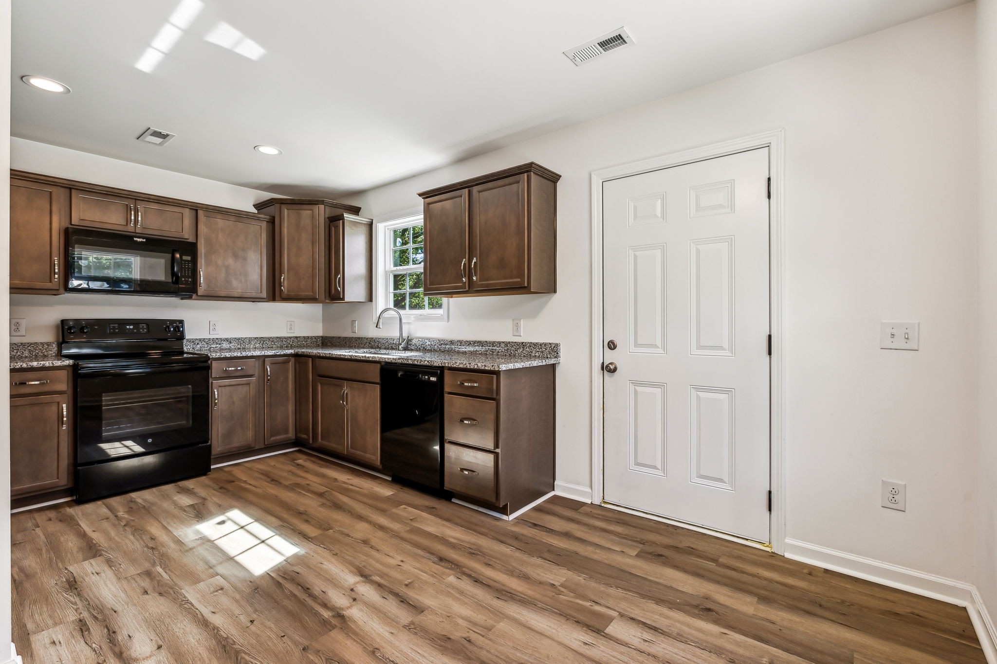 1816 Cunningham Ridge Clarksville, TN 37040 - Photo 10 of 32 a kitchen with a stove and a sink