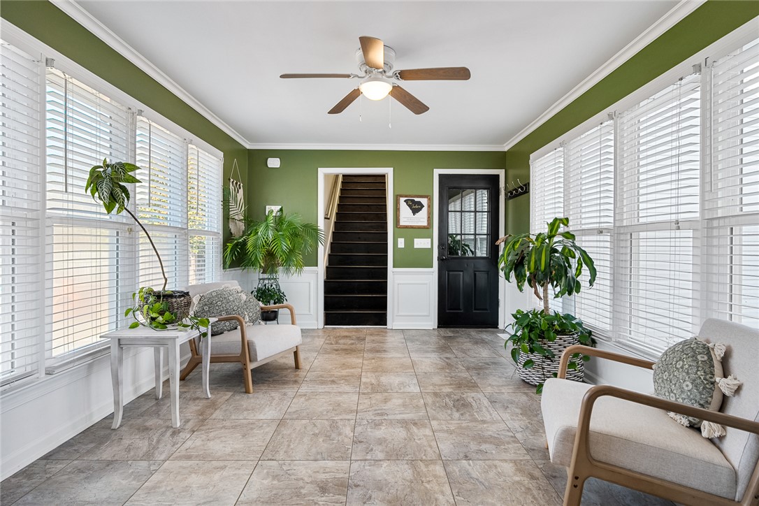 112 C-10-220 Anderson, SC 29621 - Photo 21 of 45 This bright sunroom offers a welcoming entrance with abundant natural light.