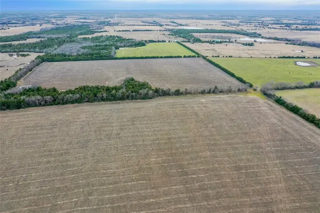 a view of a lake with a big yard