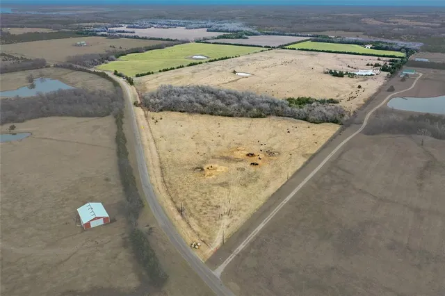 a view of a swimming pool and an outdoor space