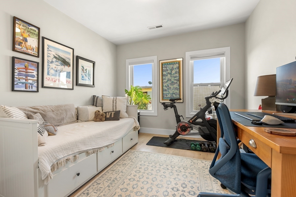 51 Cutler Street, Unit 3 Winthrop, MA 02152 - Photo 18 of 28 a bedroom with bed tv and window