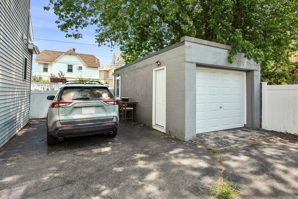 51 Cutler Street, Unit 3 Winthrop, MA 02152 - Photo 22 of 28 a view of a car in front of a house