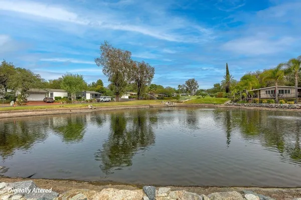 a view of a lake with houses