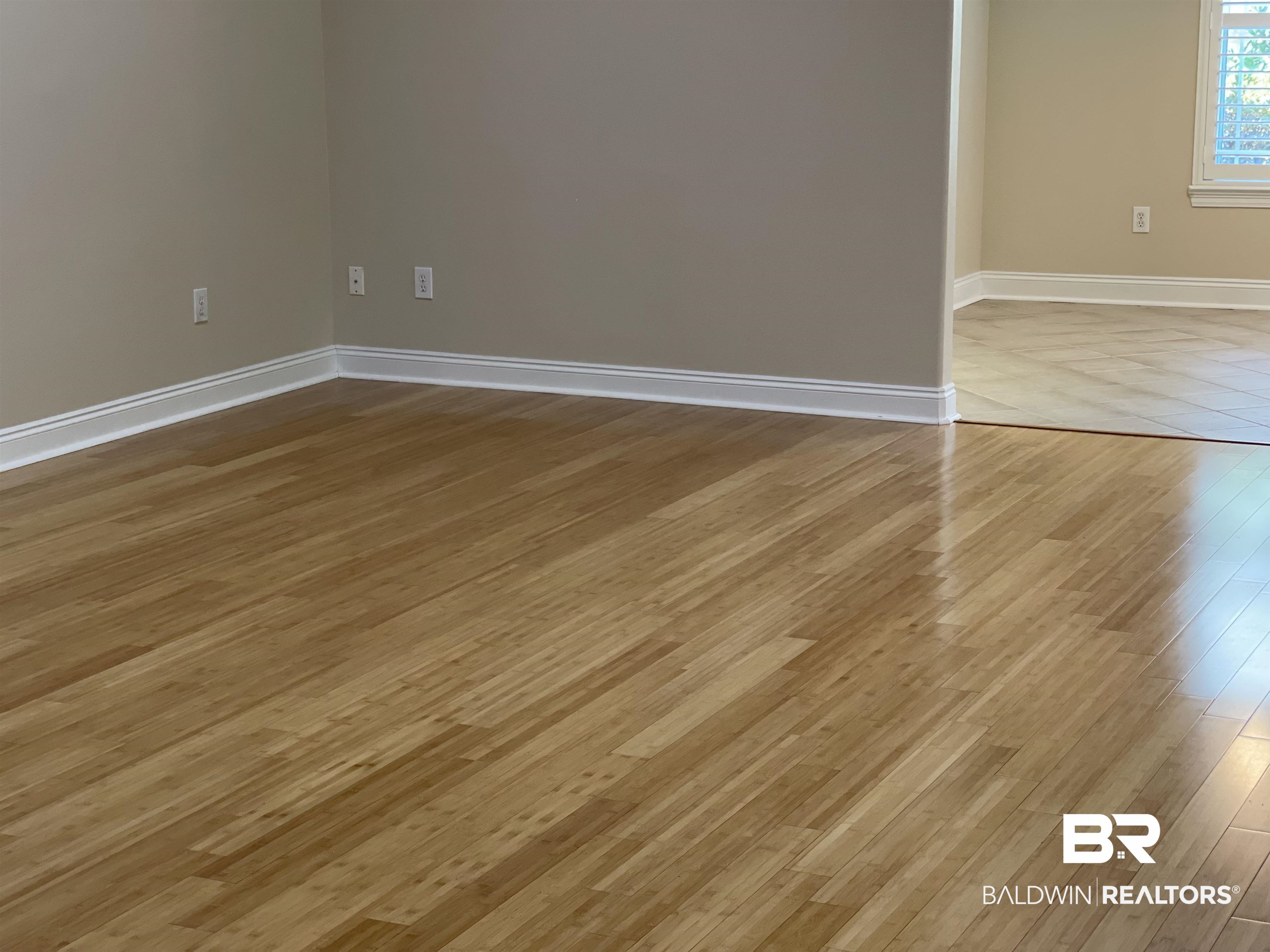 210 Savannah Circle Foley, AL 36535 - Photo 8 of 18 Unfurnished room featuring hardwood / wood-style floors