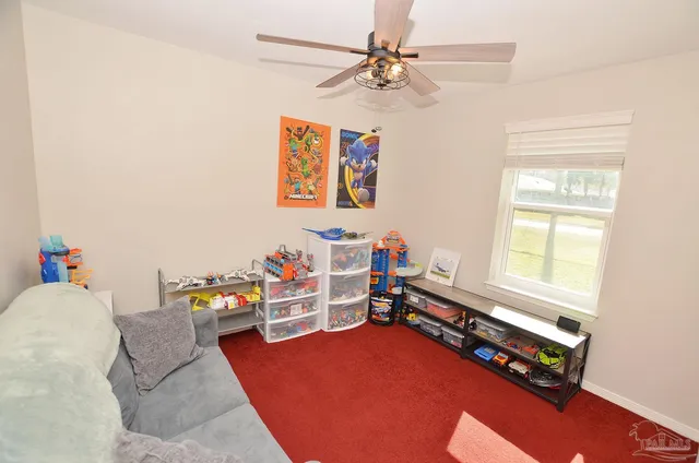 a room with furniture and a window