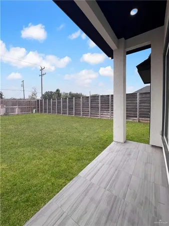 a view of a backyard with a garden