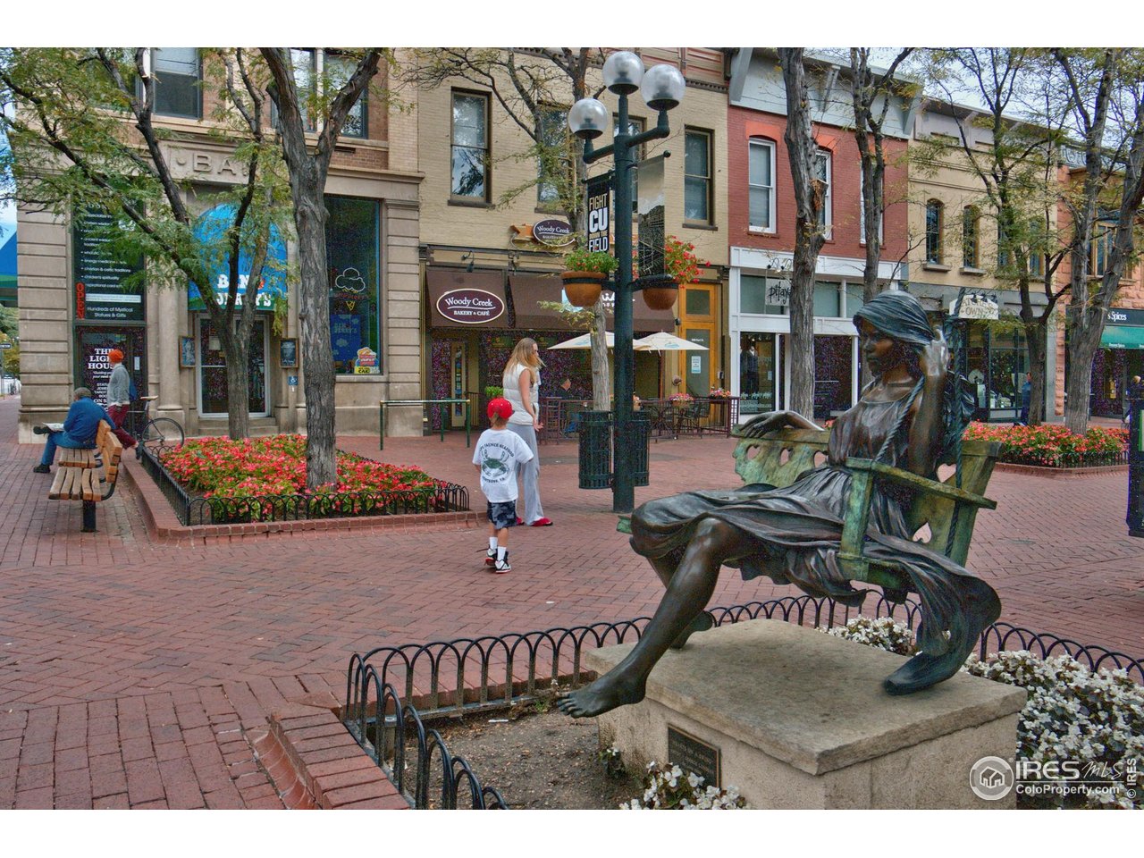 1430 18th Street, Unit 1 Boulder, CO 80302 - Photo 23 of 29 a view of a brick building with many windows