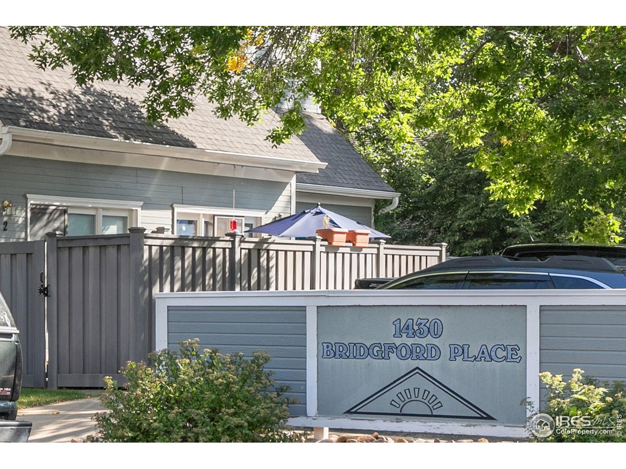 1430 18th Street, Unit 1 Boulder, CO 80302 - Photo 28 of 29 a view of a deck with a fence