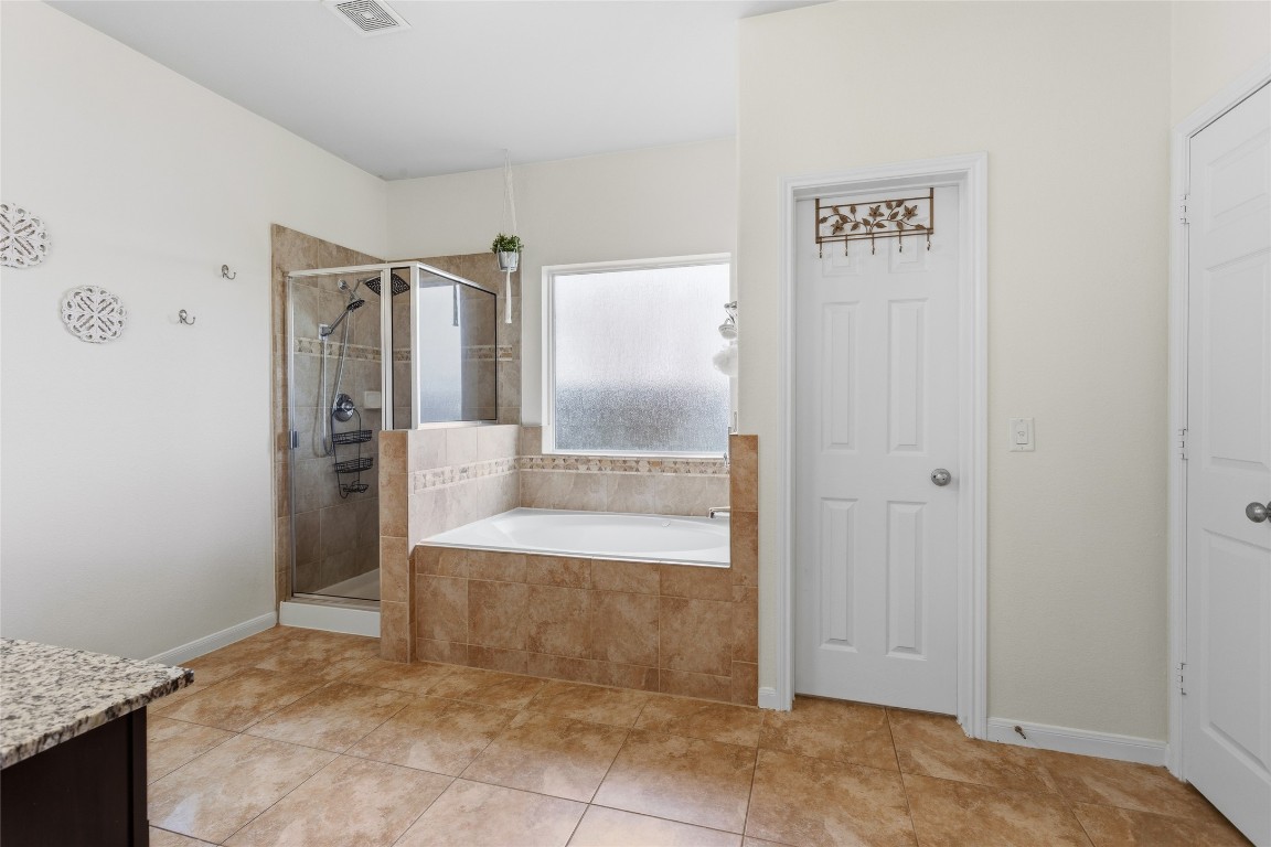 12402 Garnet Road Mont Belvieu, TX 77535 - Photo 18 of 49 a view of an empty room