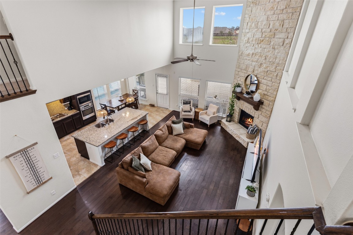 12402 Garnet Road Mont Belvieu, TX 77535 - Photo 25 of 49 a living room with furniture and a rug