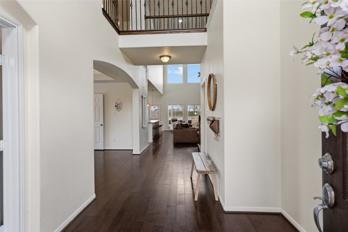 12402 Garnet Road Mont Belvieu, TX 77535 - Photo 5 of 49 a view of entryway with livingroom and wooden floor