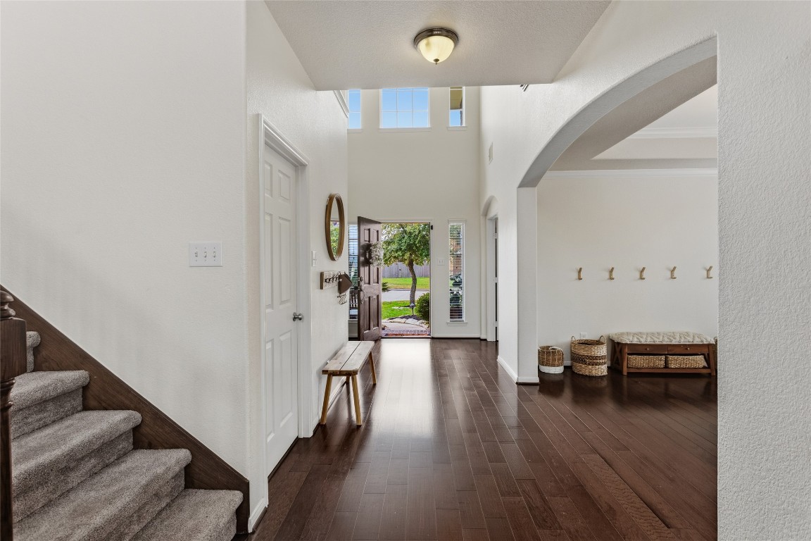 12402 Garnet Road Mont Belvieu, TX 77535 - Photo 6 of 49 a view of a livingroom with furniture and hardwood floor