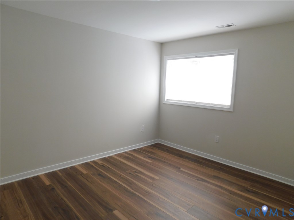 5322 Adams Road Quinton, VA 23141 - Photo 17 of 21 2nd bedroom featuring a window with white trim, li