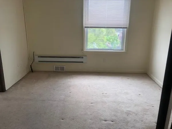 an empty room with a window