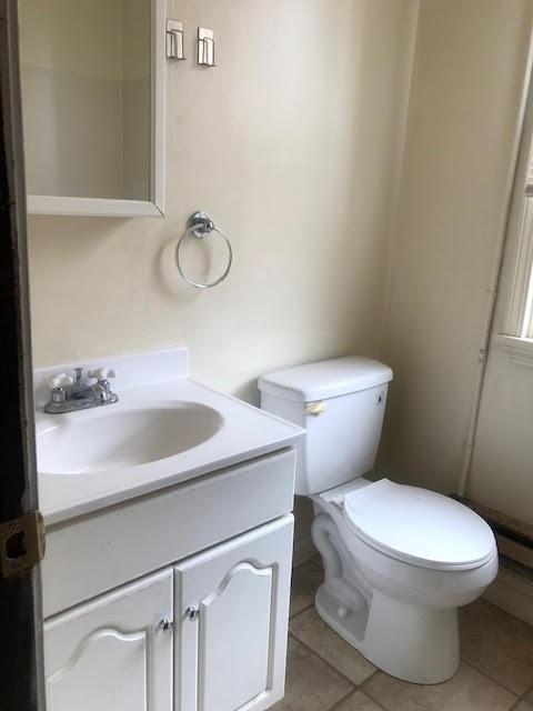 18 Haberman Avenue, Unit 2 Pittsburgh, PA 15211 - Photo 7 of 19 a bathroom with a toilet sink and mirror