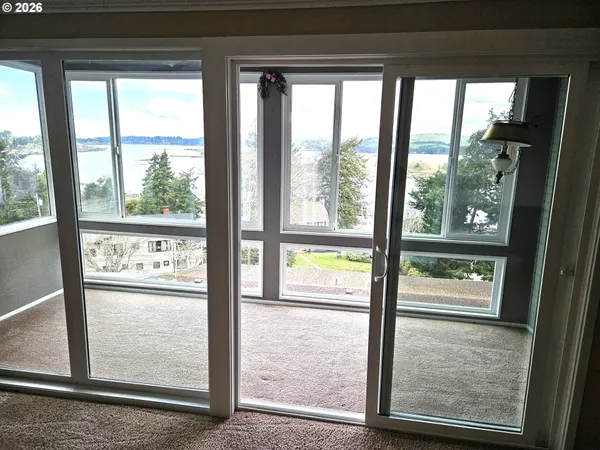 a view of a city street from a roof