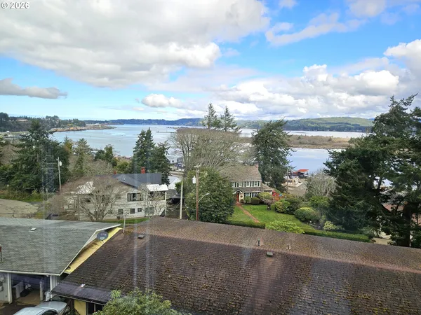 a view of a house with a street
