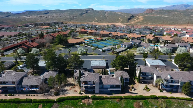 860 South Village Road, Unit H1 St. George, UT 84770 - Photo 13 of 20 Aerial perspective of suburban area featuring a mountainous background
