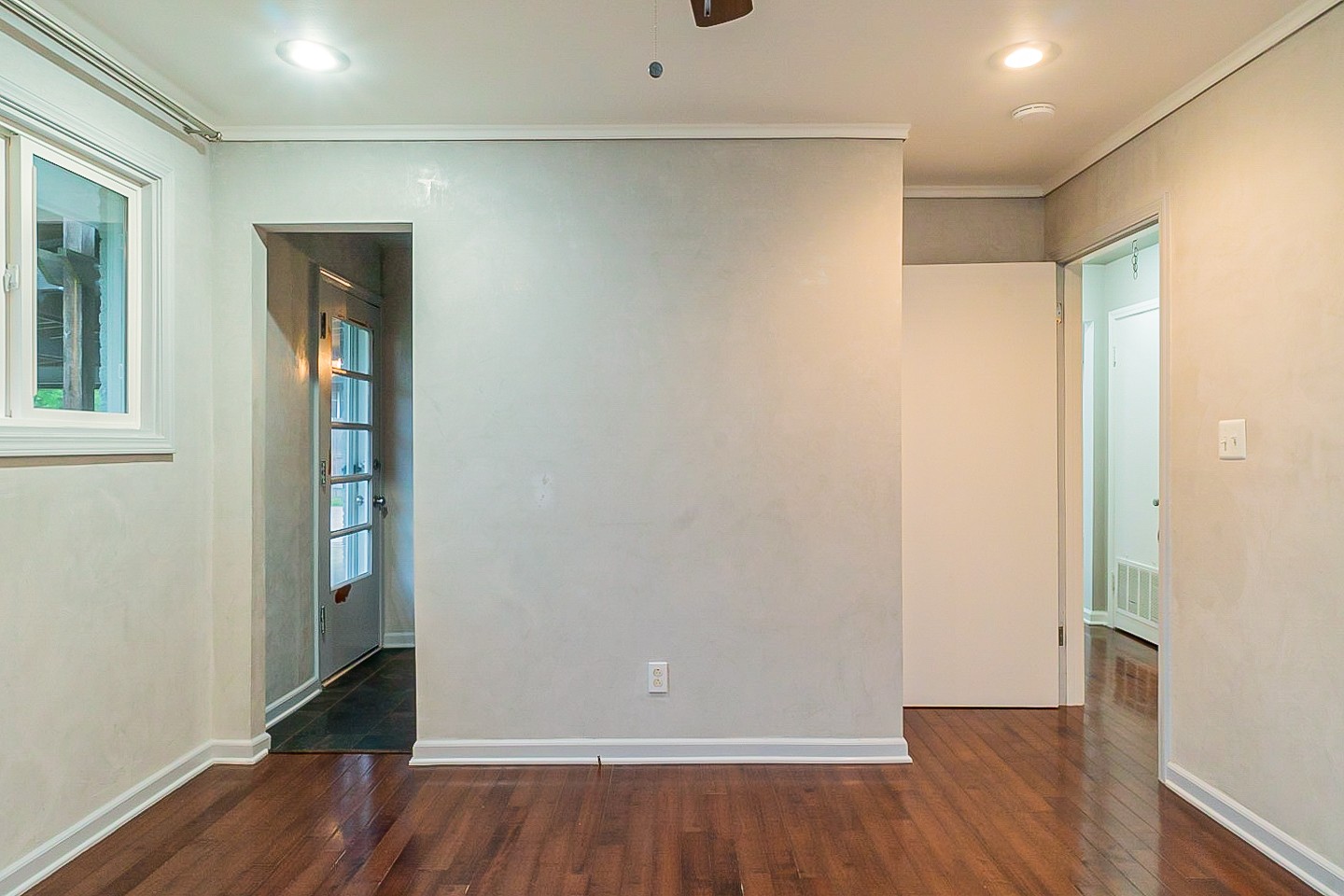 1010 Mitchell Road Nashville, TN 37206 - Photo 17 of 25 an empty room with wooden floor and entrance