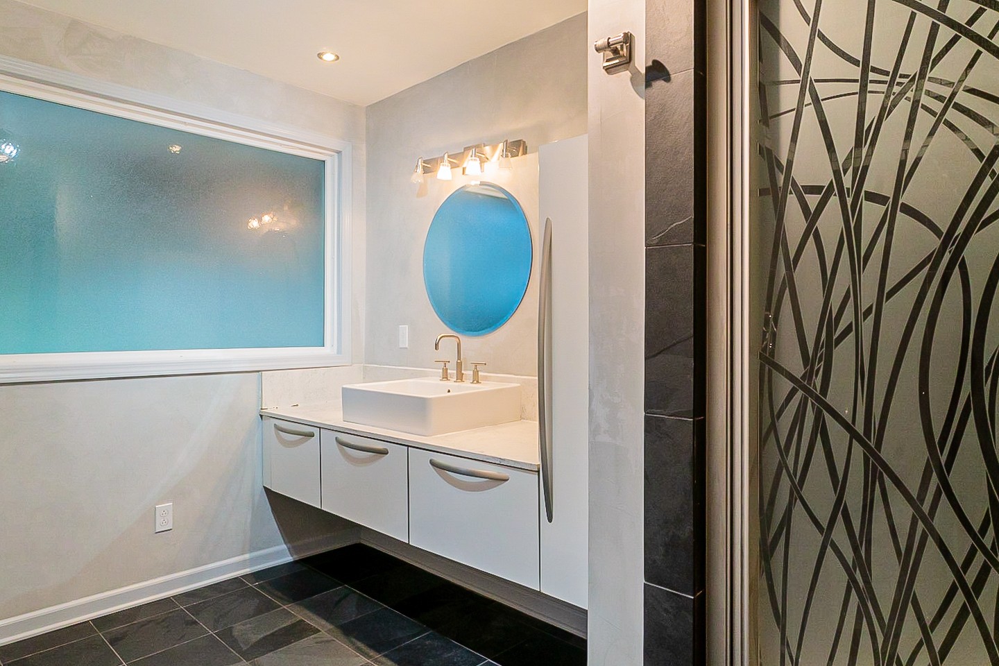 1010 Mitchell Road Nashville, TN 37206 - Photo 6 of 25 a bathroom with a sink and a mirror