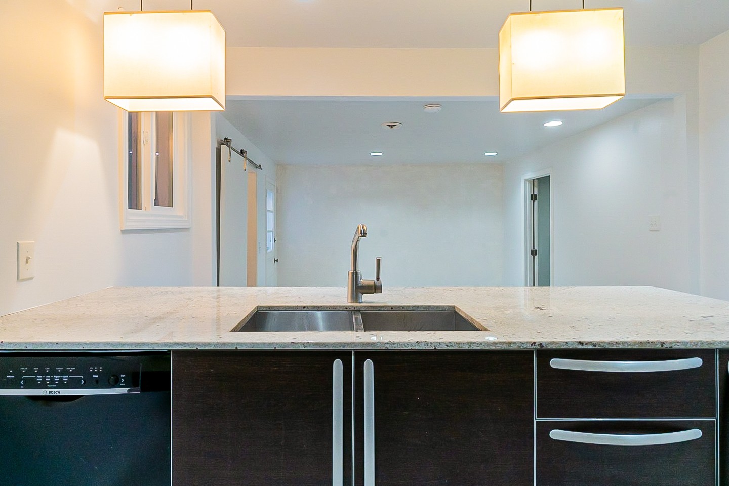 1010 Mitchell Road Nashville, TN 37206 - Photo 8 of 25 a kitchen with a sink and a refrigerator