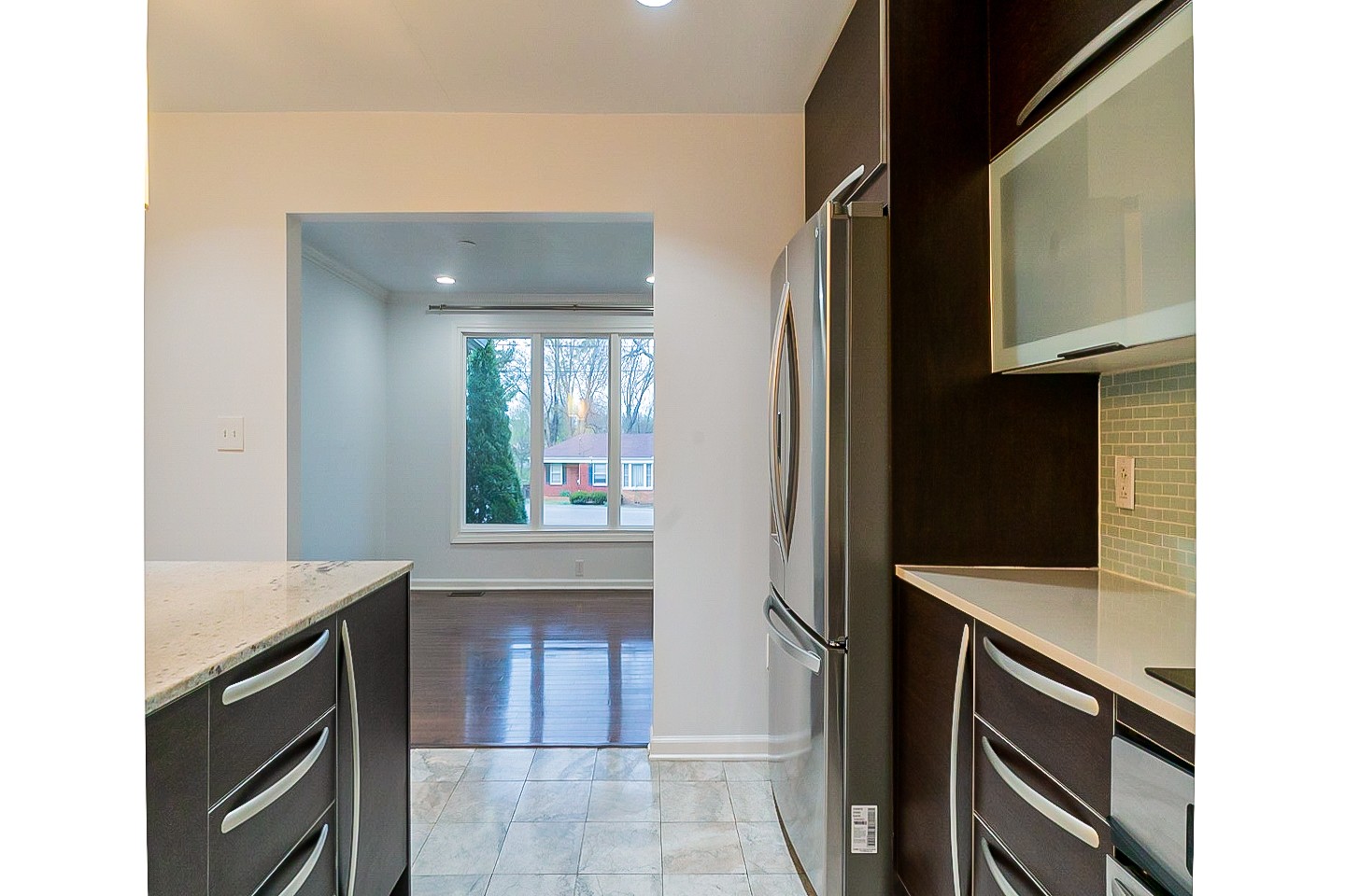 1010 Mitchell Road Nashville, TN 37206 - Photo 9 of 25 a kitchen with a sink stove and microwave