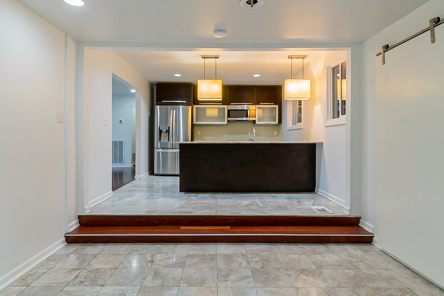 1010 Mitchell Road Nashville, TN 37206 - Photo 10 of 25 a living room with fireplace cabinet and flat screen tv