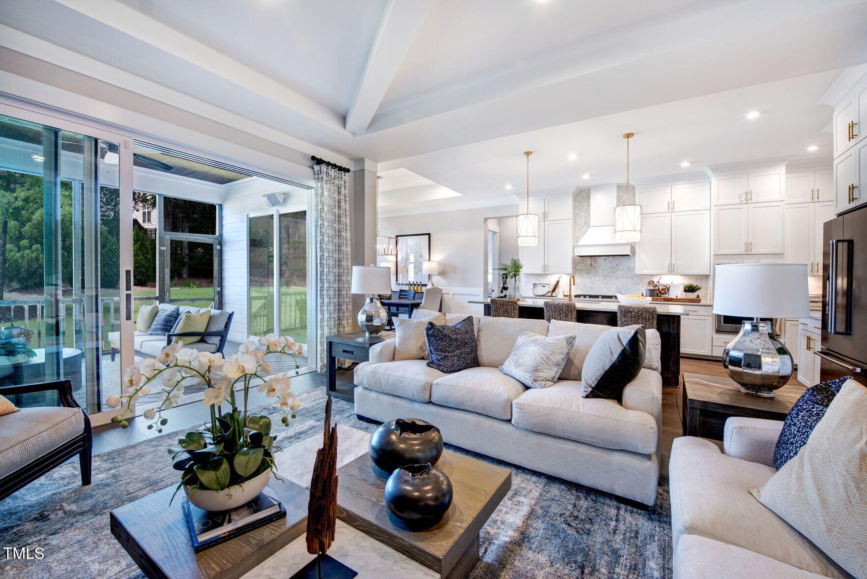 8904 Nicewonder Way Wake Forest, NC 27587 - Photo 24 of 50 a living room with furniture and a large window