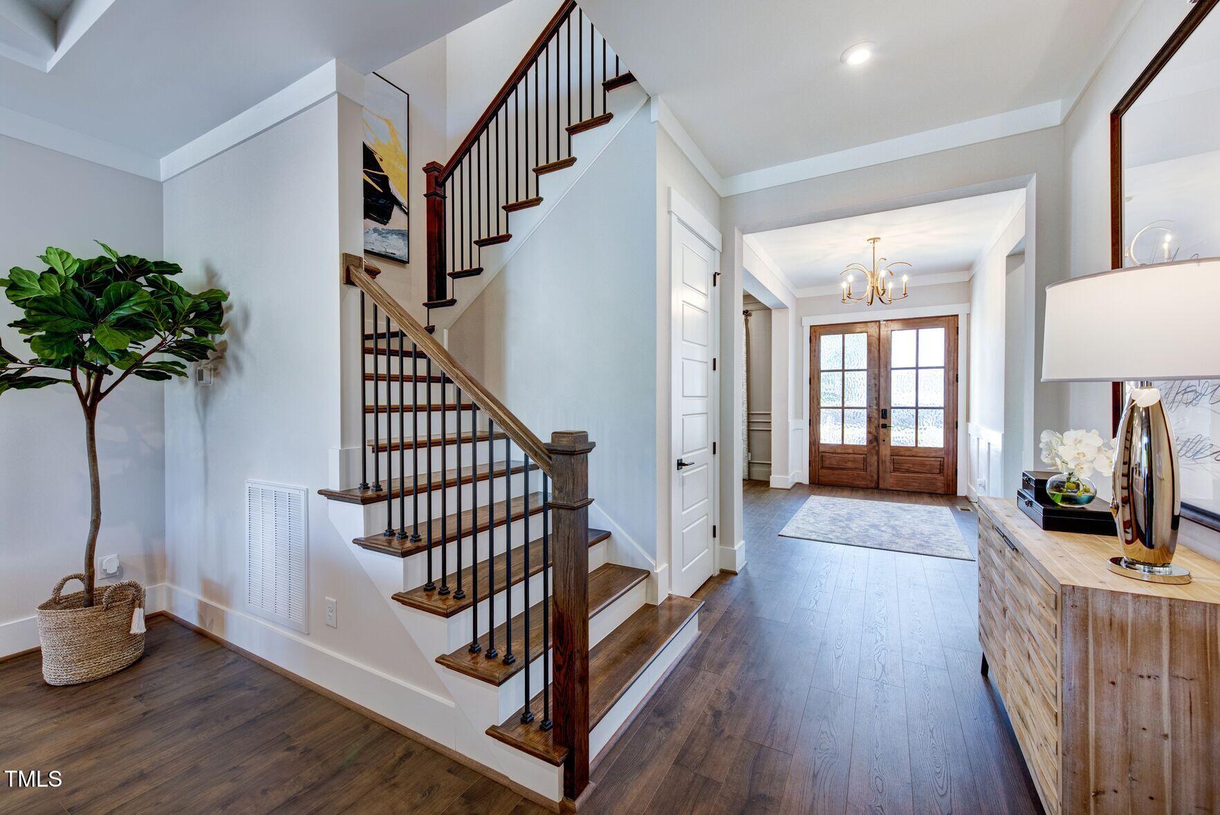 8904 Nicewonder Way Wake Forest, NC 27587 - Photo 27 of 50 a view of entryway and hall with wooden floor