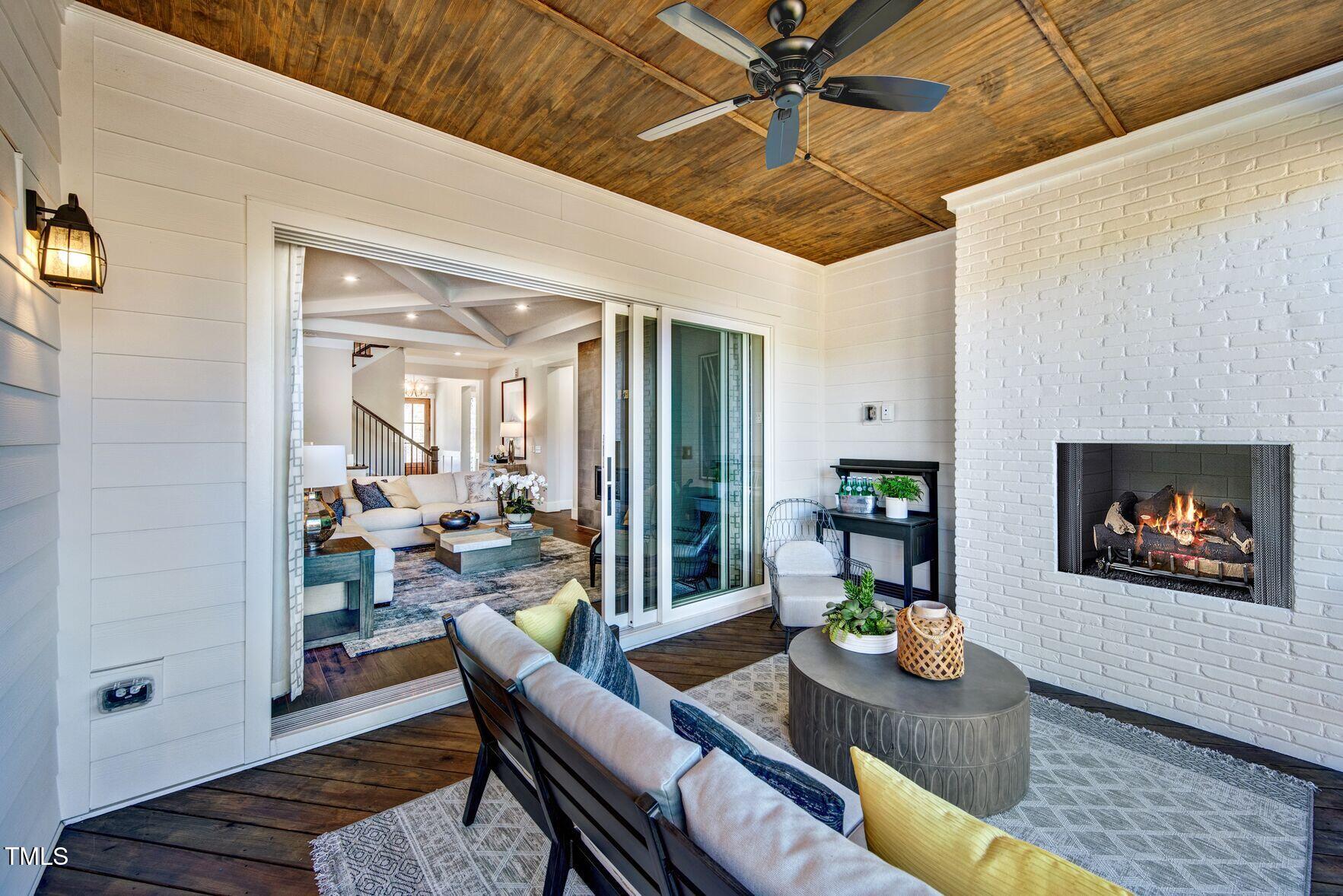 8904 Nicewonder Way Wake Forest, NC 27587 - Photo 41 of 50 a living room with furniture and wooden floor