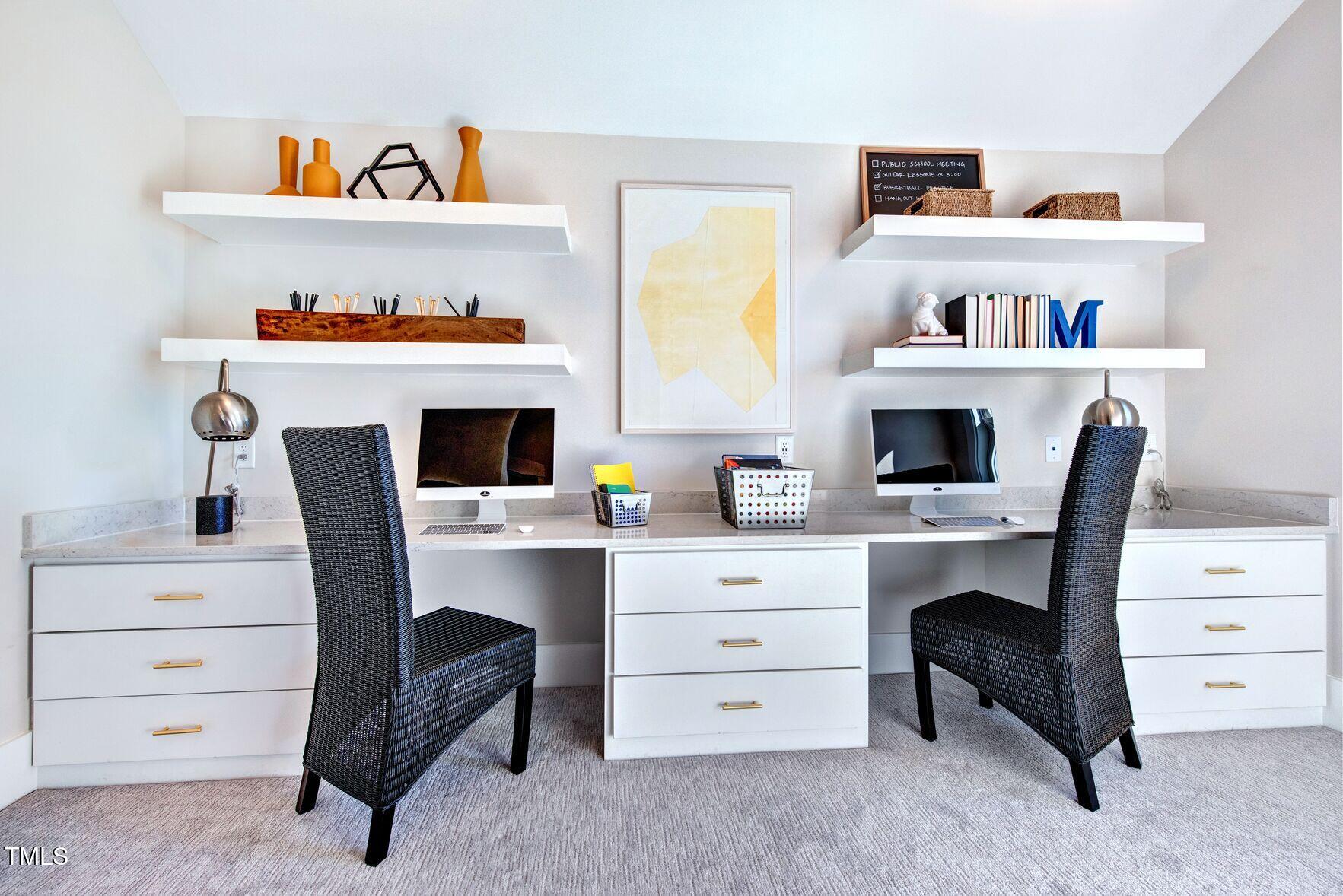 8904 Nicewonder Way Wake Forest, NC 27587 - Photo 43 of 50 a view of a workspace with furniture